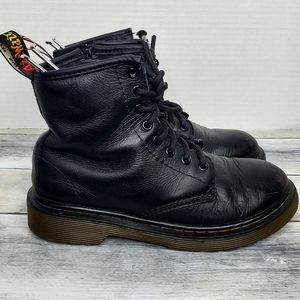 Girls black Dr. Martens multi stich boots.